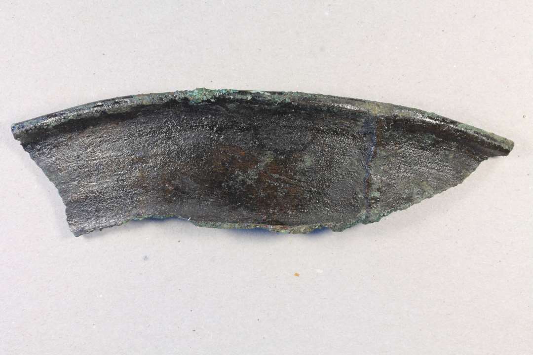  Fragment af malmgryde. Kons.��Randsk�r. m�l: 11,2 cm.