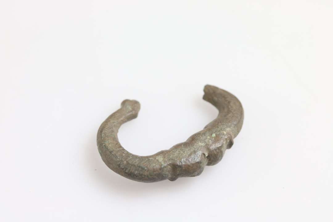 1 del af b�ltesp�nde, bronze. M�l: ca 3 cm.