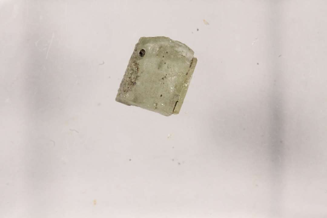 Tessera, gennemsigtig guldfolieret.