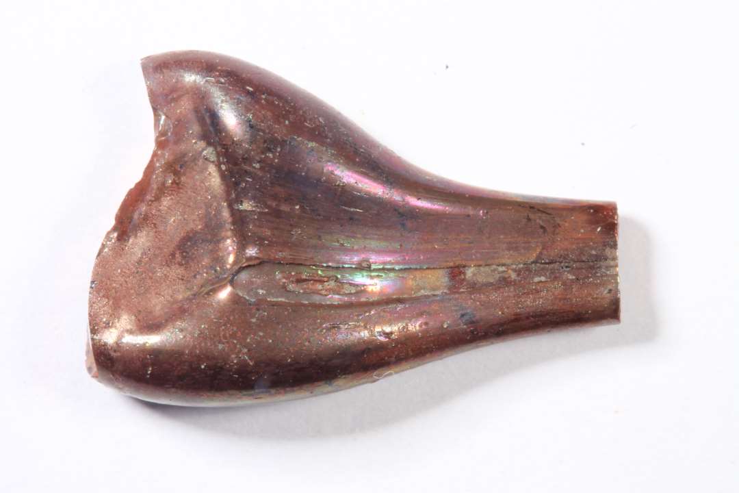 Tangaftryk. Gennemsigtig, r�dligt skinnende bel�gning